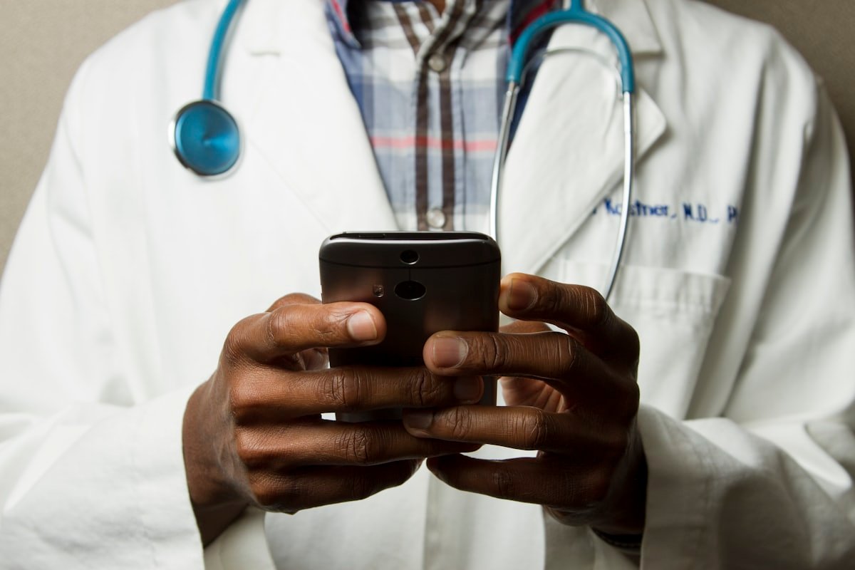 Doctor using a tablet in a modern clinic